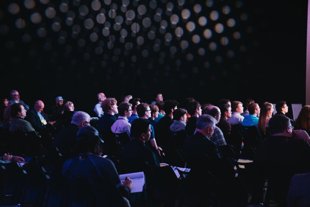 A group of professionals listening to a lecture